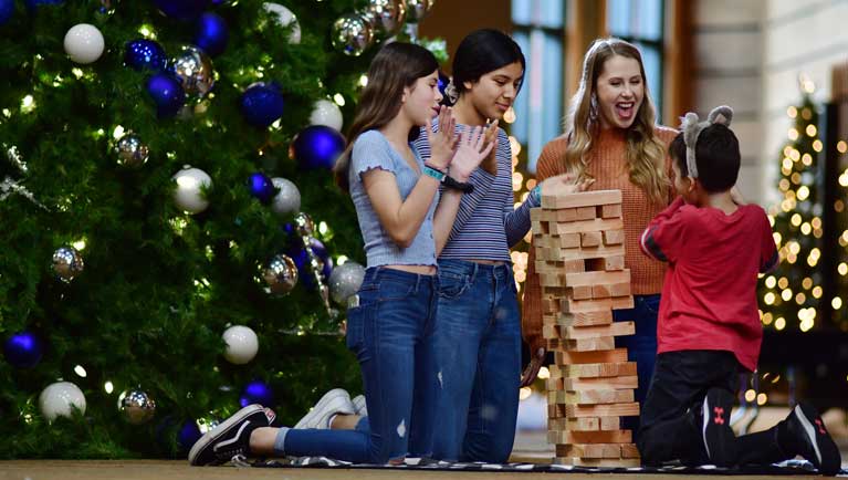 family playing jenga