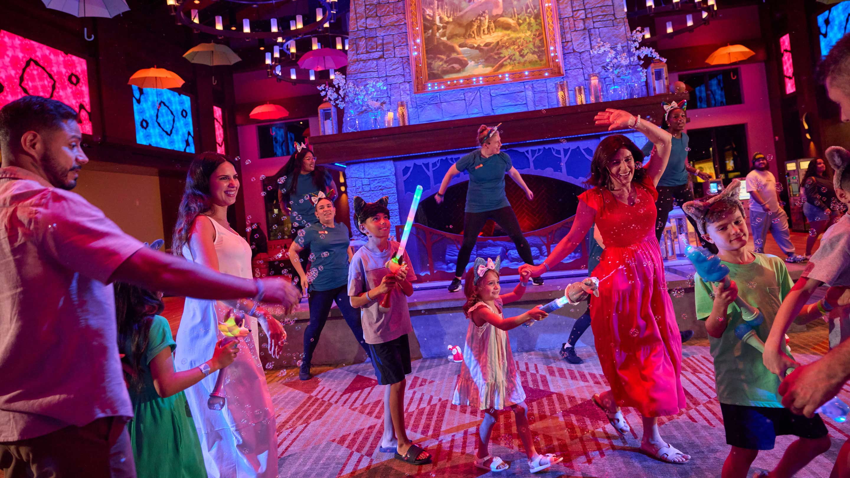 Children and Adults dancing in a fun, lively setting