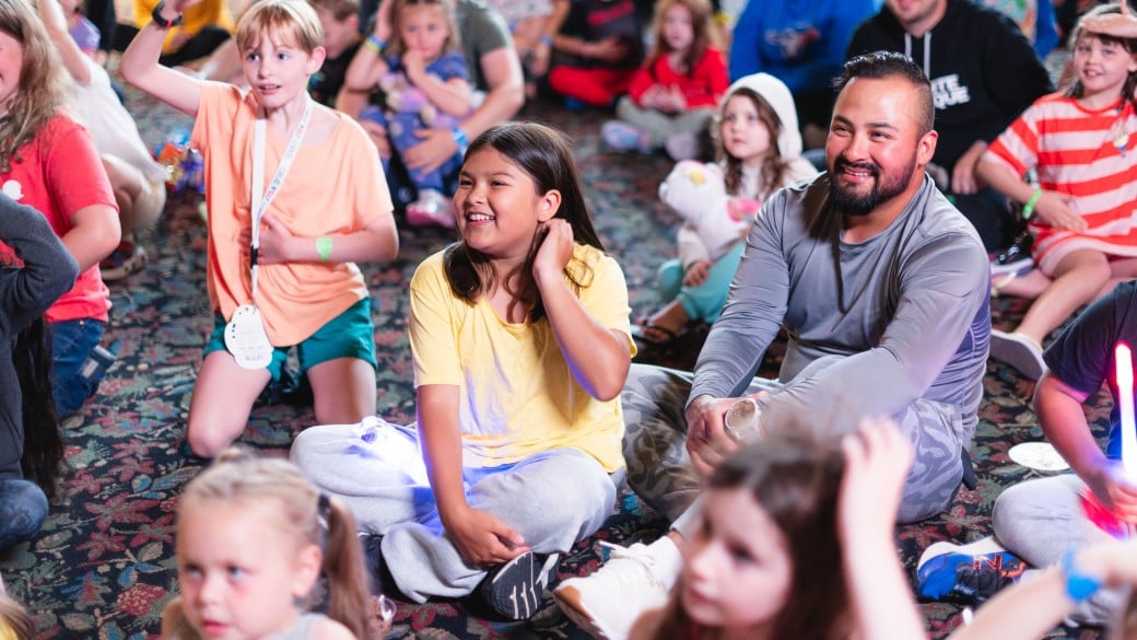Guest enjoying the magic show at Great Wolf Lodge