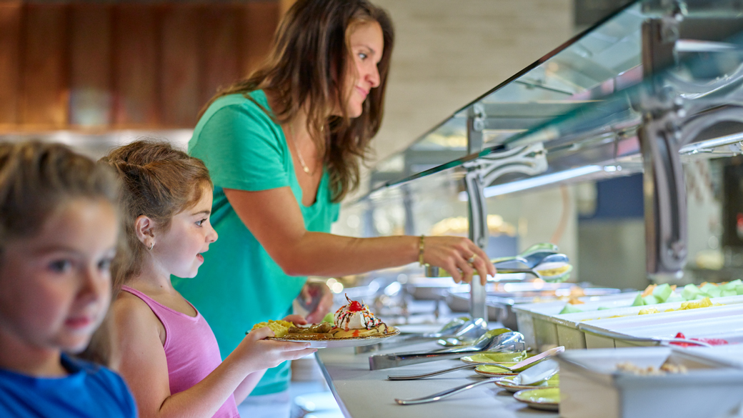 Mother getting breakfast at Great Wolf Lodge