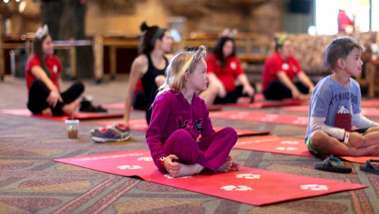 Children learning yoga