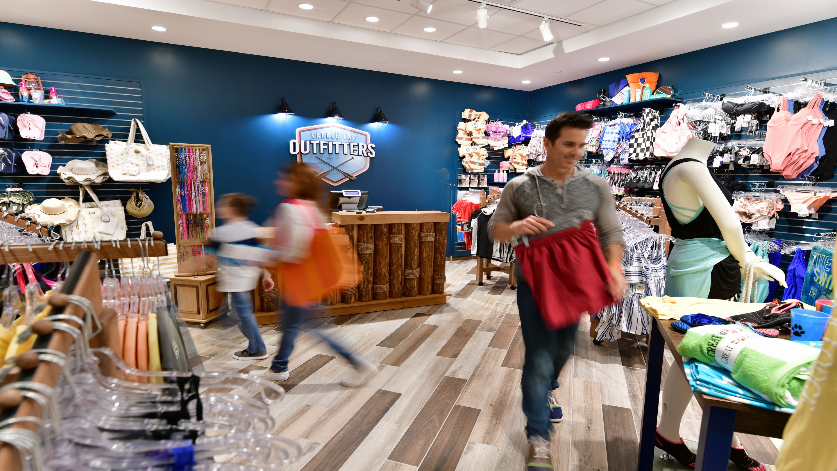 Customers shopping in Paddle Bay Outfitters