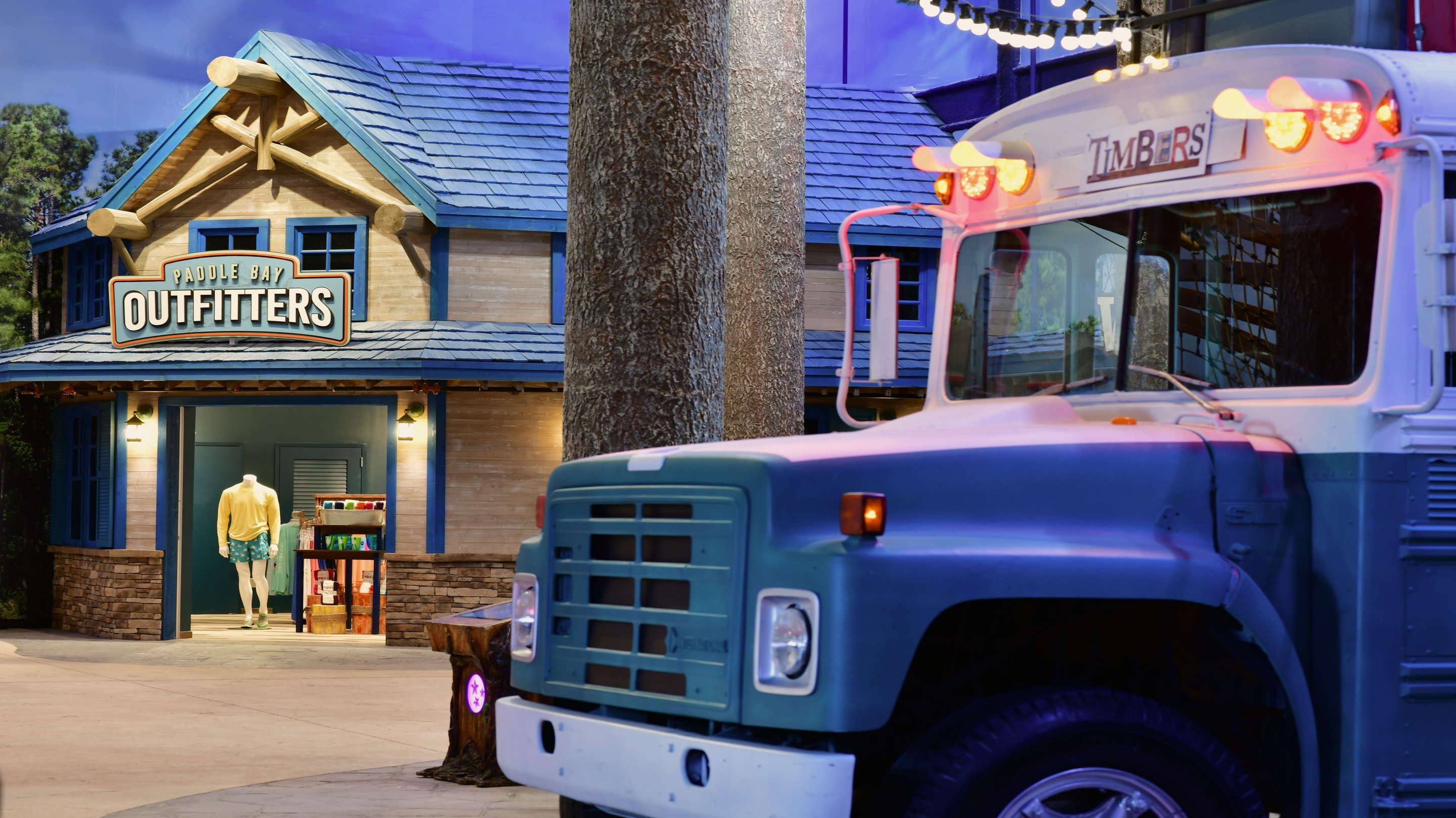Exterior of Paddle Bay Outfitters with the Timber Bus