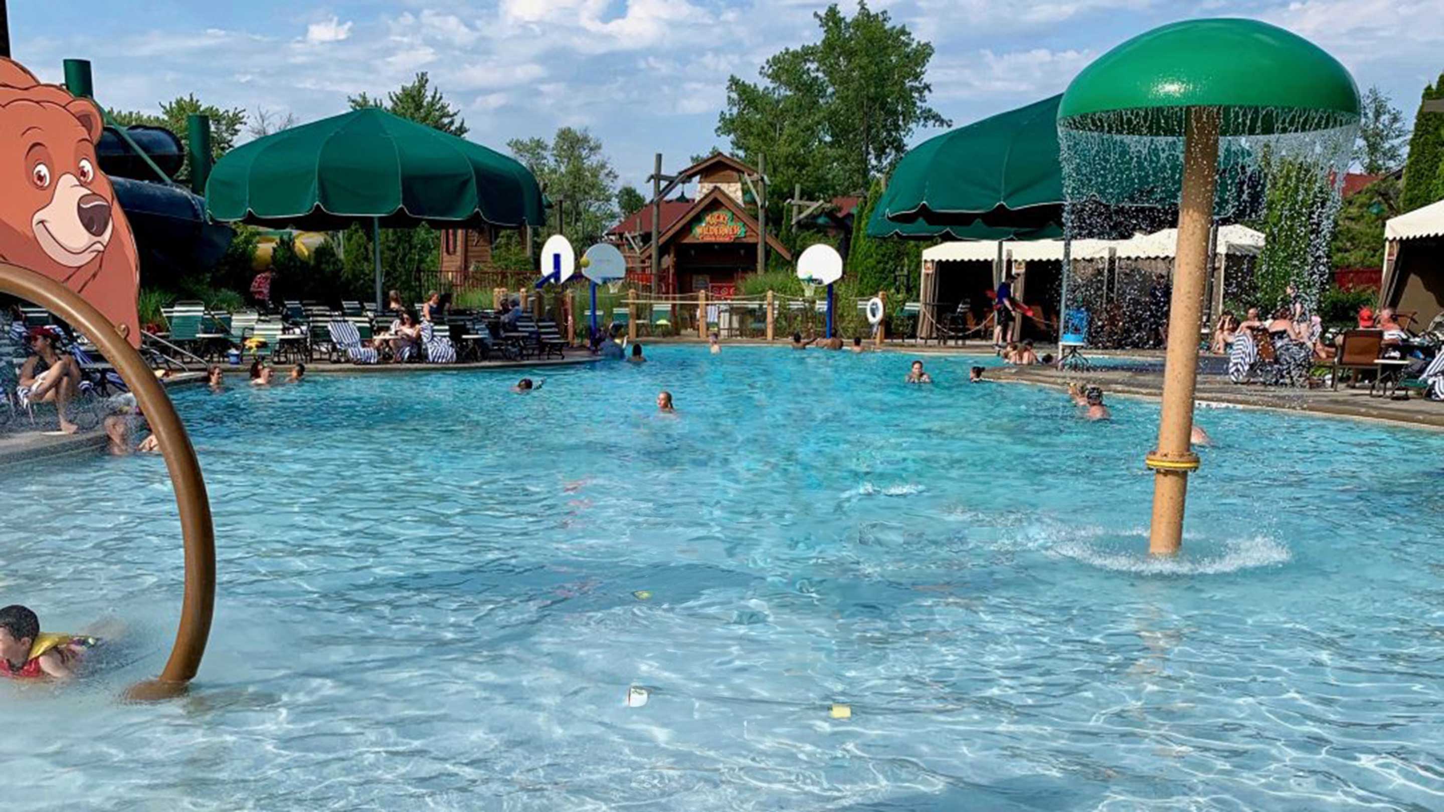 Three basketball hoops in an outdoor pool