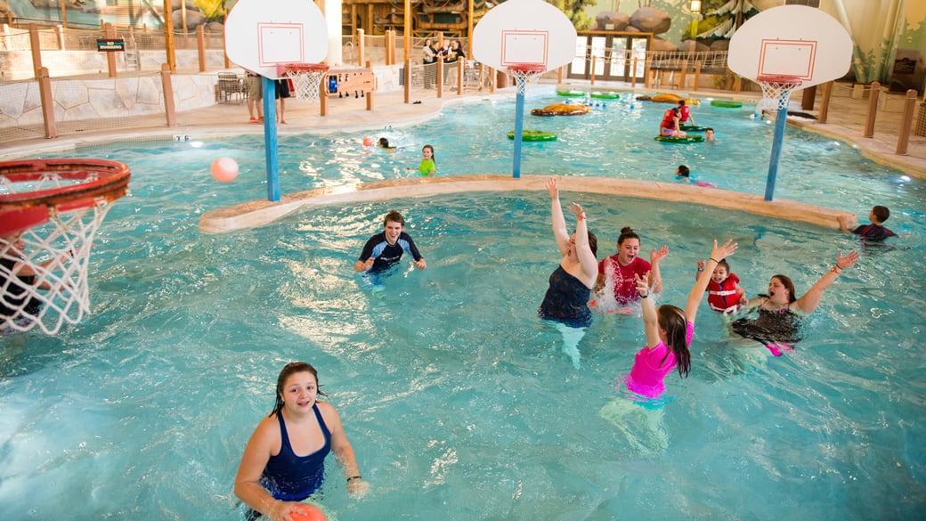 Families enjoying as they play hoops in Chinook Cove