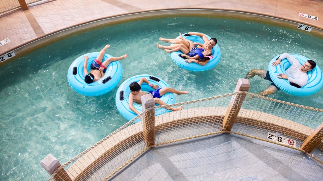 Family enjoying in a pool
