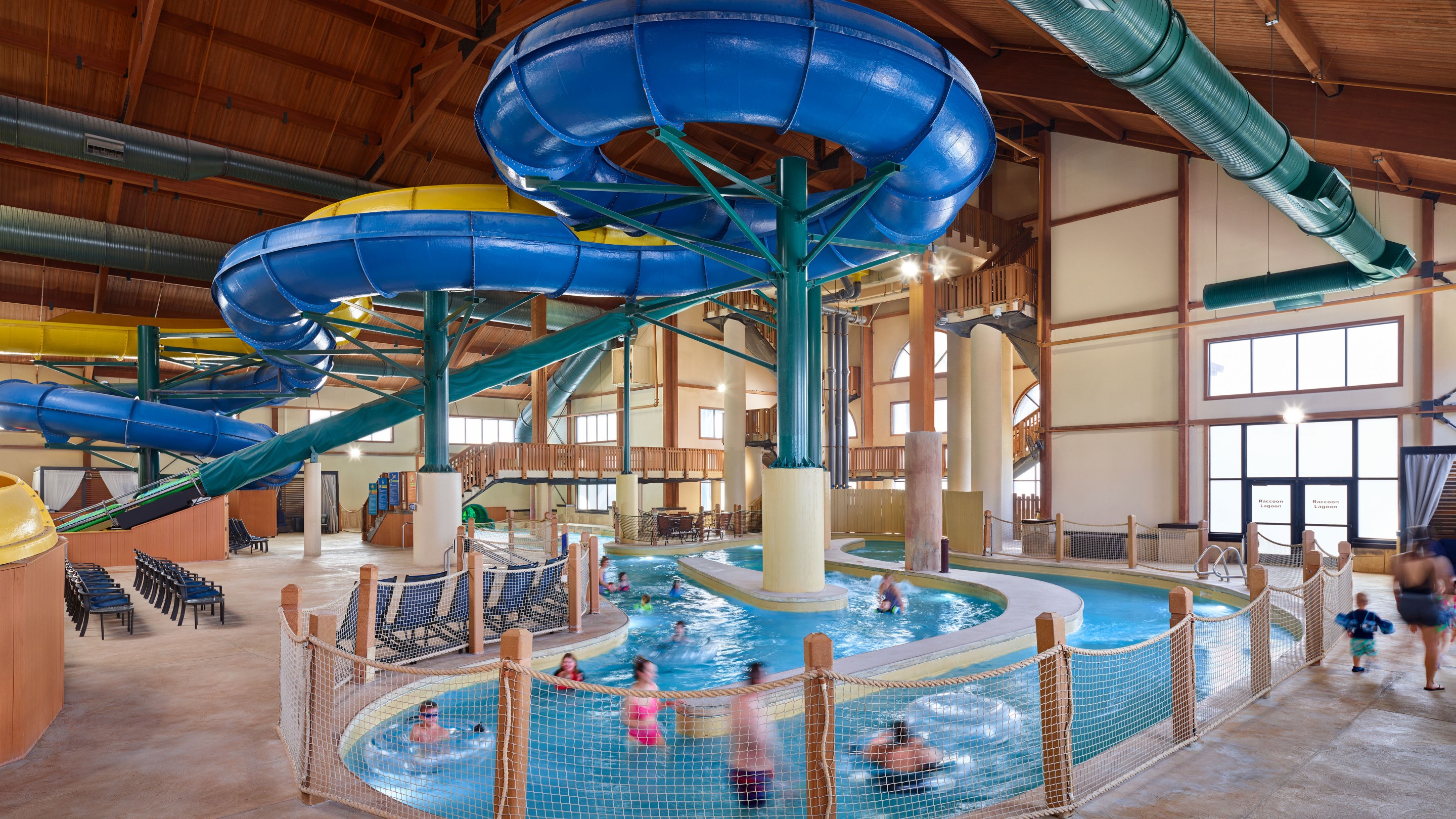 wide shot of people playing in the lazy river
