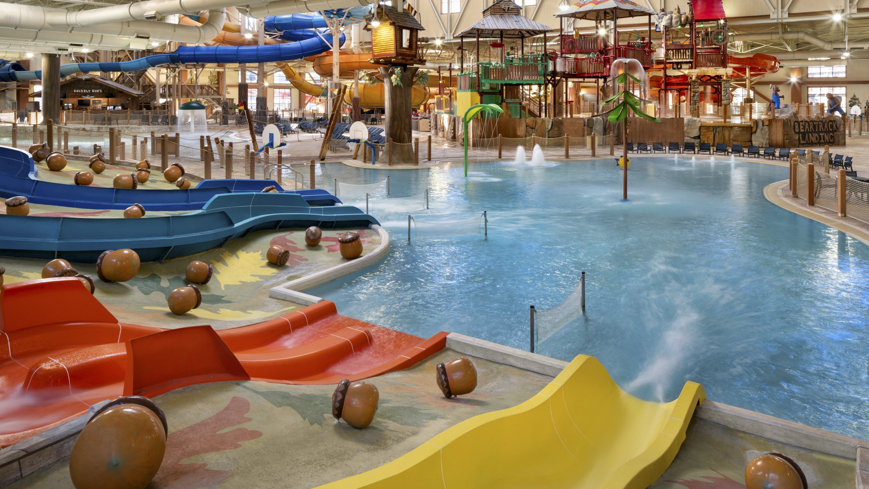 Vibrant indoor waterpark with colorful slides