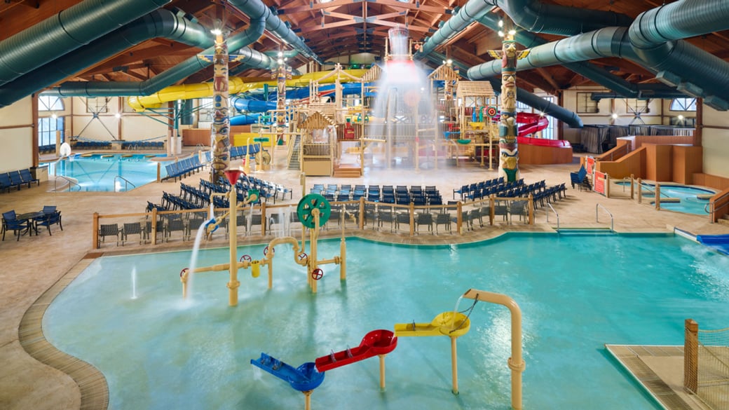 a family enjoying great wolf lodge events