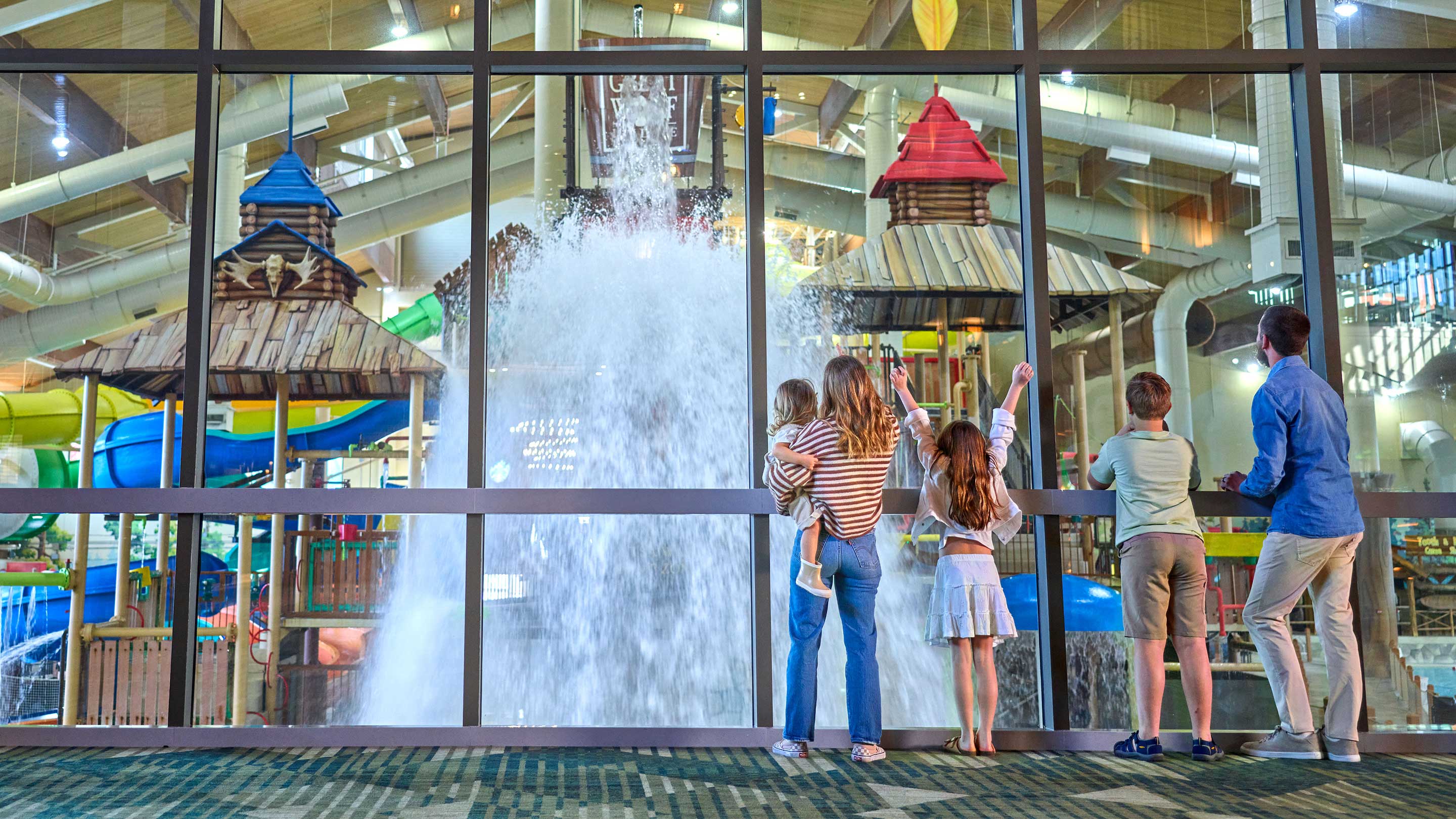 family watching the dipping water bucket at fort Mackenzie