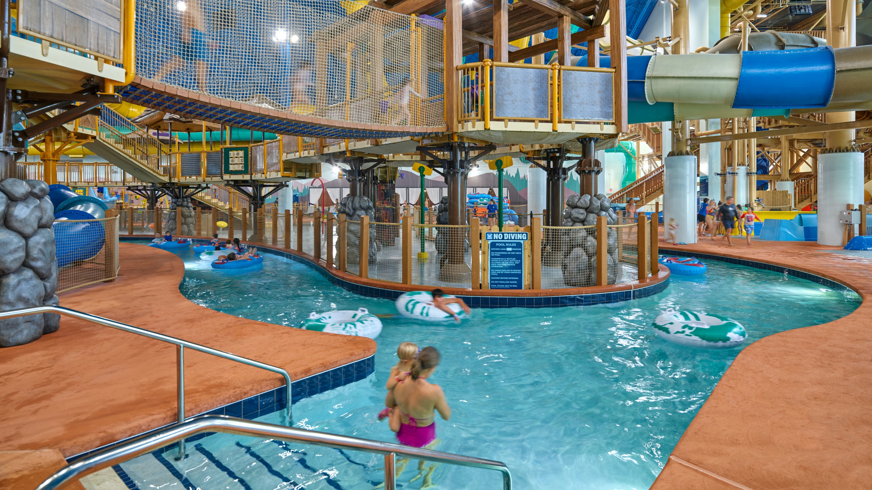 upper view of the water tree fort as guests enjoy the lazy river under the same.