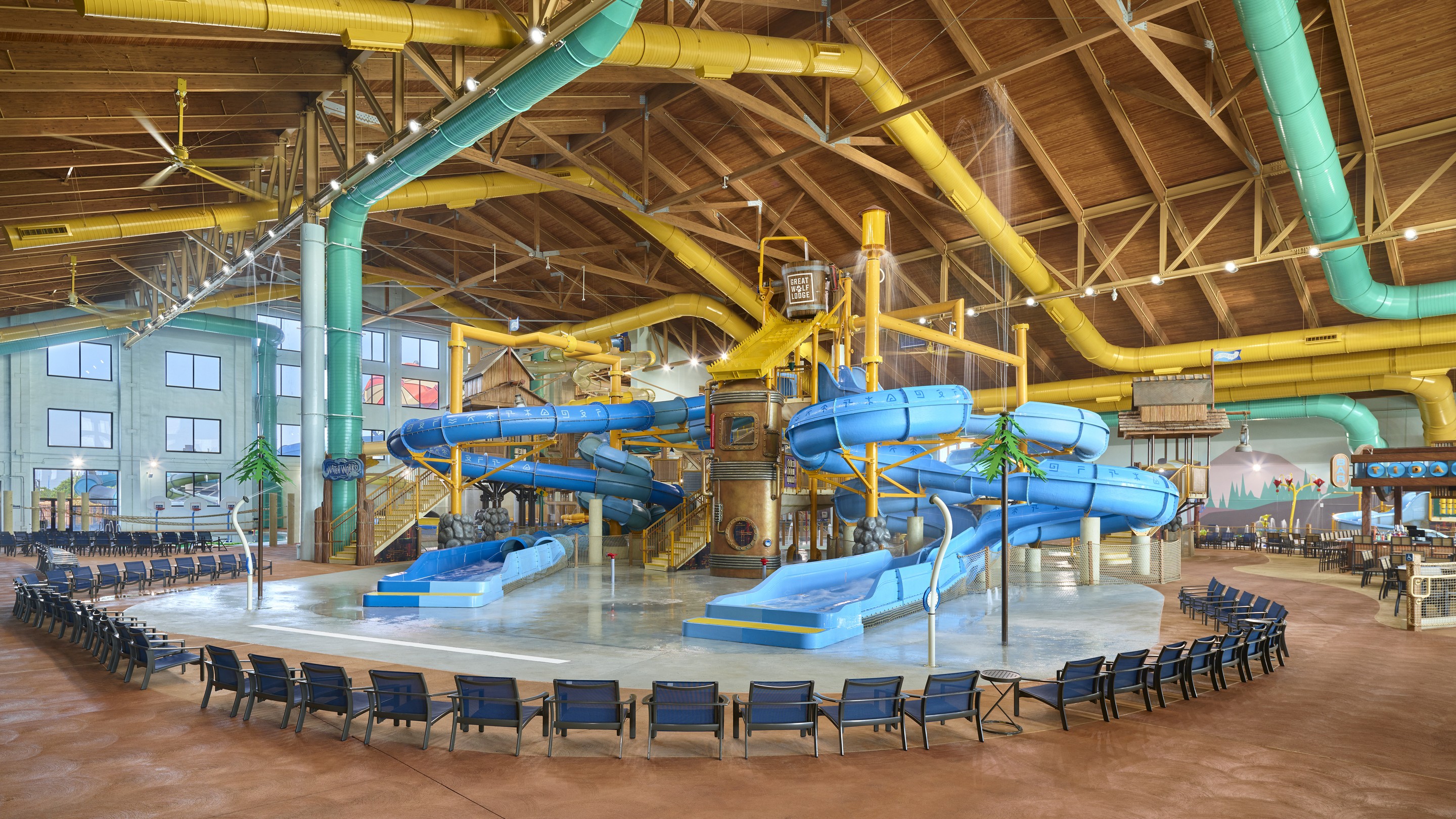 water pouring down from the bucket in a water tree fort