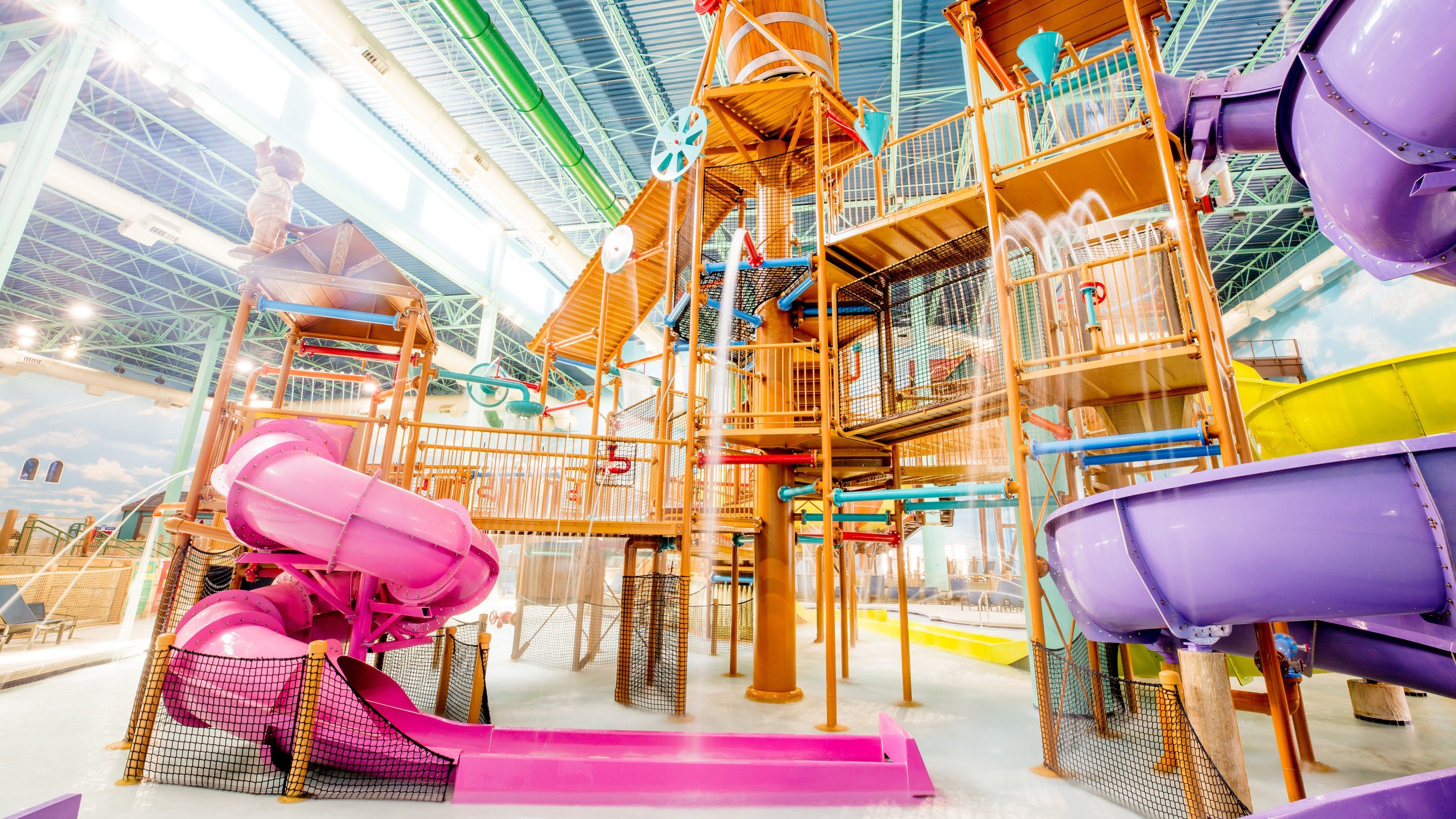 view of a variety of colorful water slides