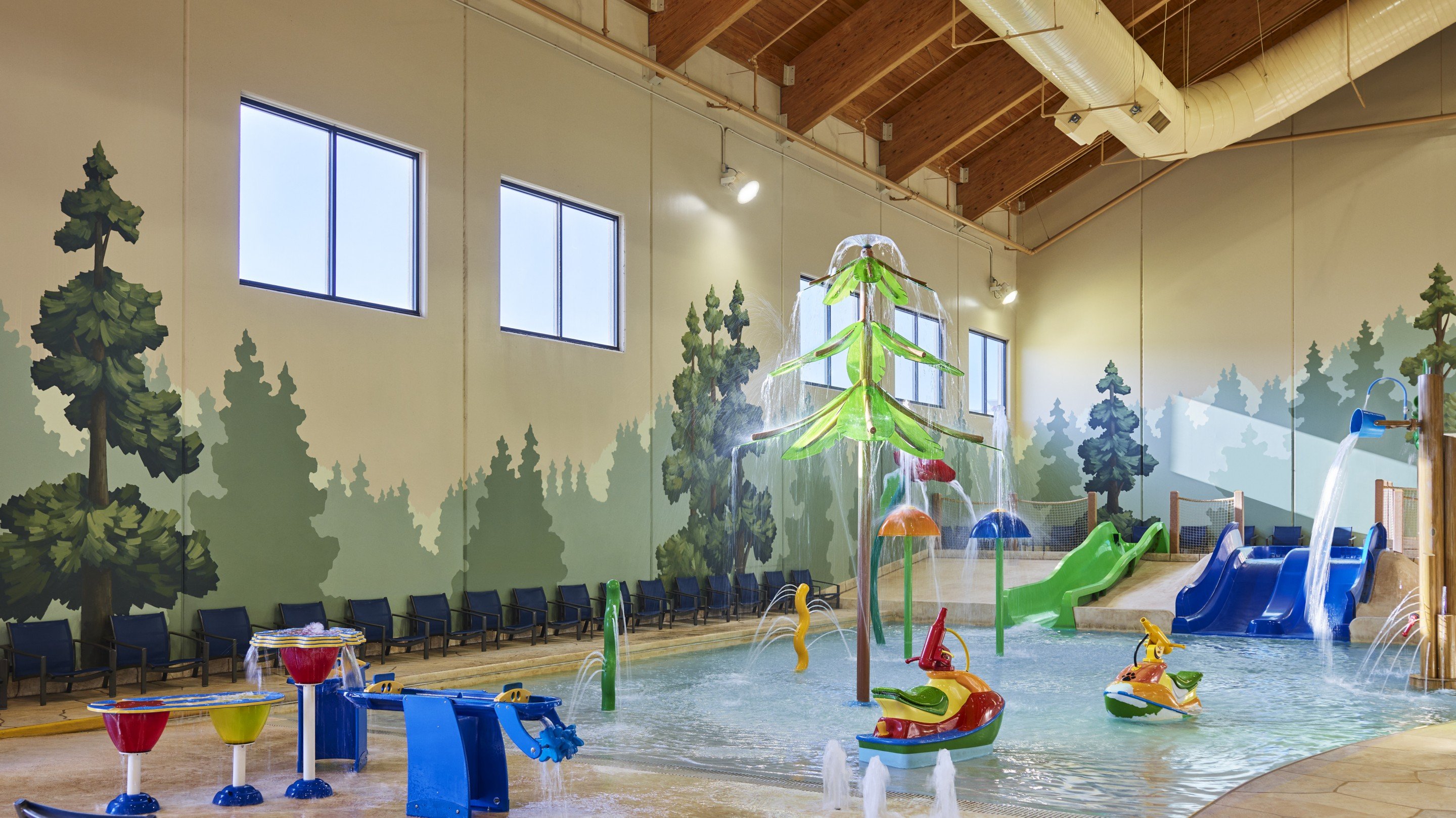 Multiple colorful slides in the indoor warterpark
